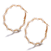Pearls wrapped around ear rings
